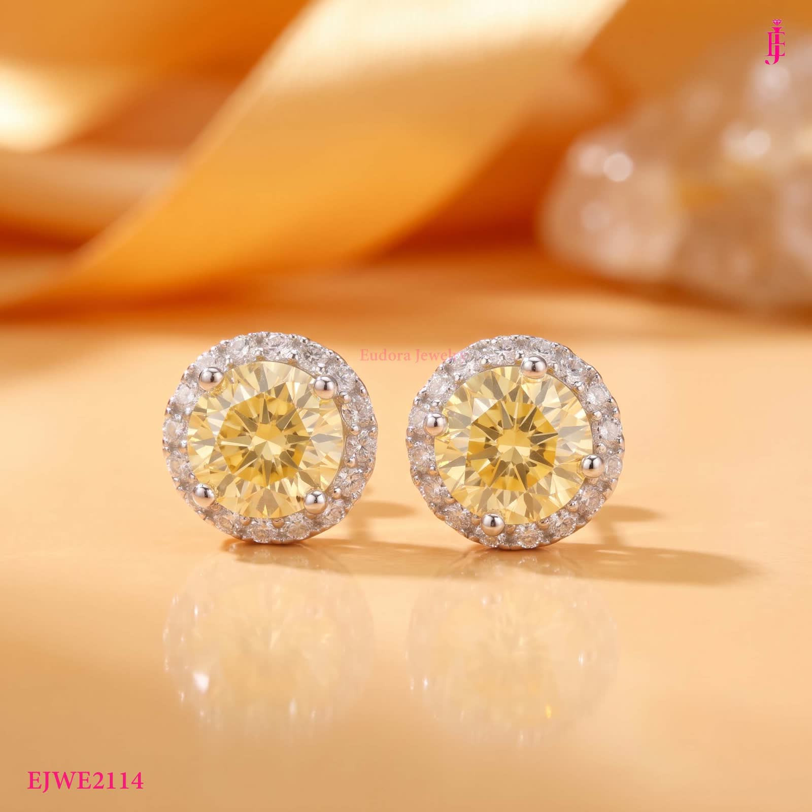 Yellow Cubic Zirconia Halo Stud Earrings in Platinum-Plated Sterling Silver - View 1