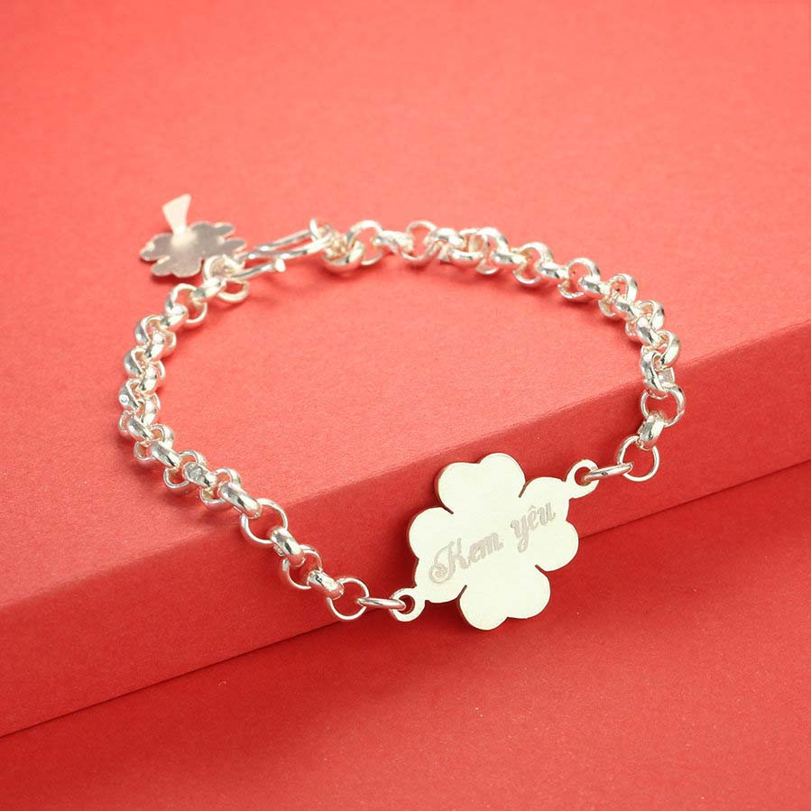 Silver bracelet for baby in the shape of a four-leaf clover with name engraved upon request SBR1024