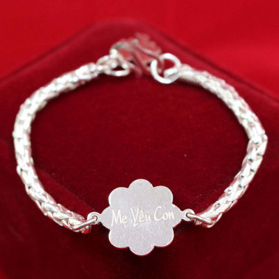 Silver baby bracelet shaped like a flower with name engraved upon request SBR1006