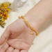 Butterfly Charm Bead Bracelet - Gold finish - on the wrist