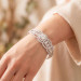 Halo Bangle Bracelet in Platinum-Plated Silver - worn on the wrist