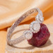 Three Stone Floral Halo Moissanite Bangle in Platinum-Plated Silver - annotated 9 mm center and two 7 mm side stones