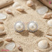 Pearl Halo Stud Earrings in Platinum-Plated Sterling Silver - View 2
