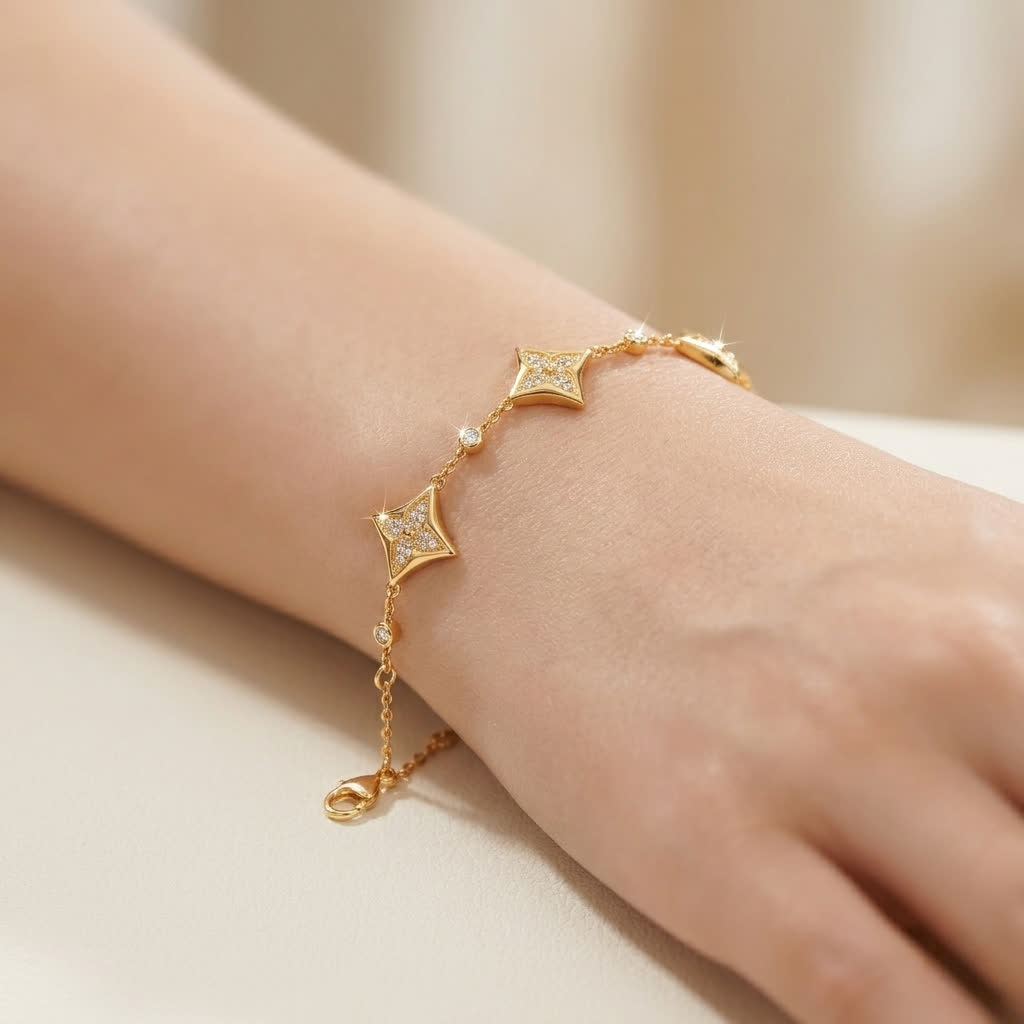 Four-Petal Floral Station Bracelet worn on the wrist