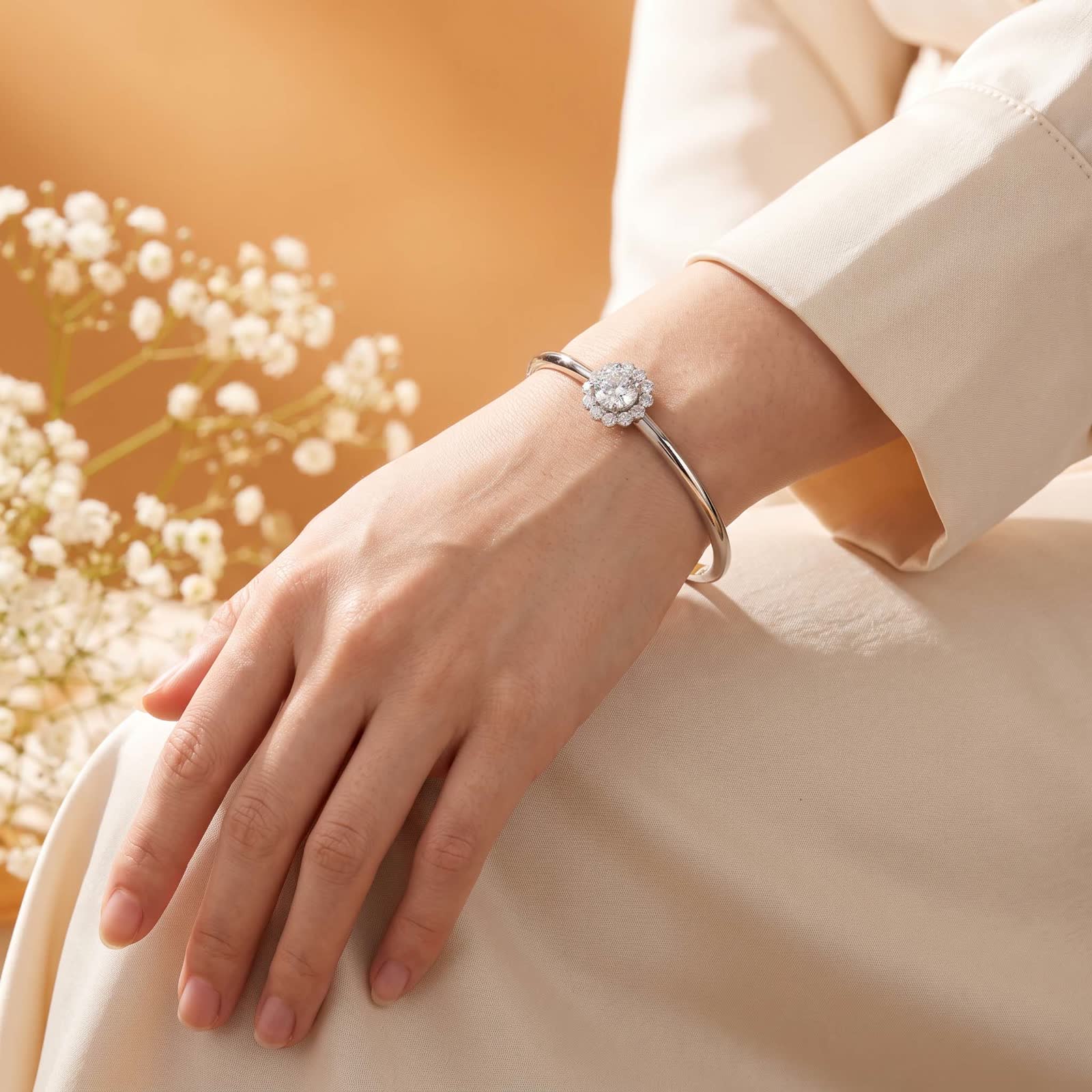 Round halo bangle worn on the wrist