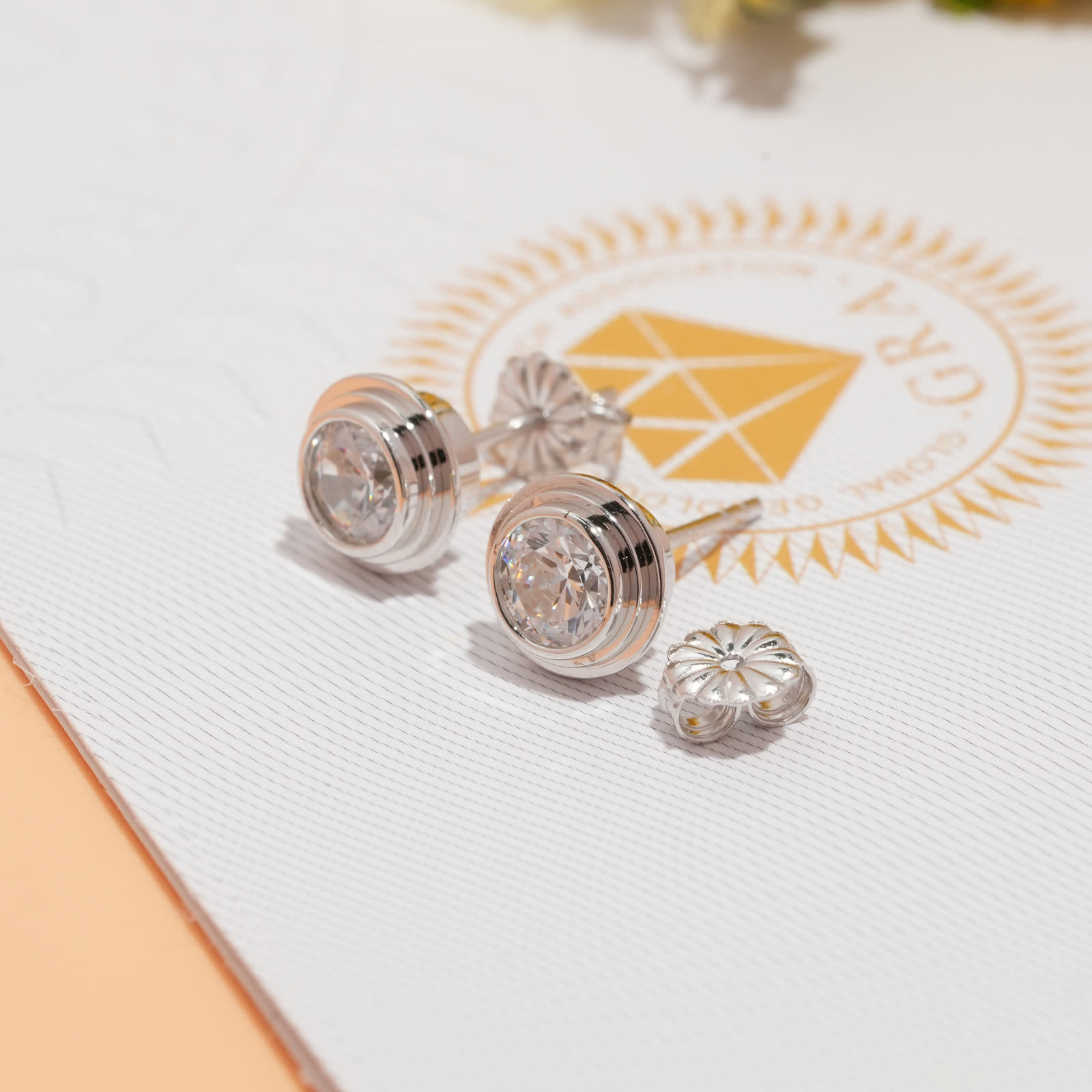 Silver-Tone Round Moissanite Bezel Stud Earrings - detail view