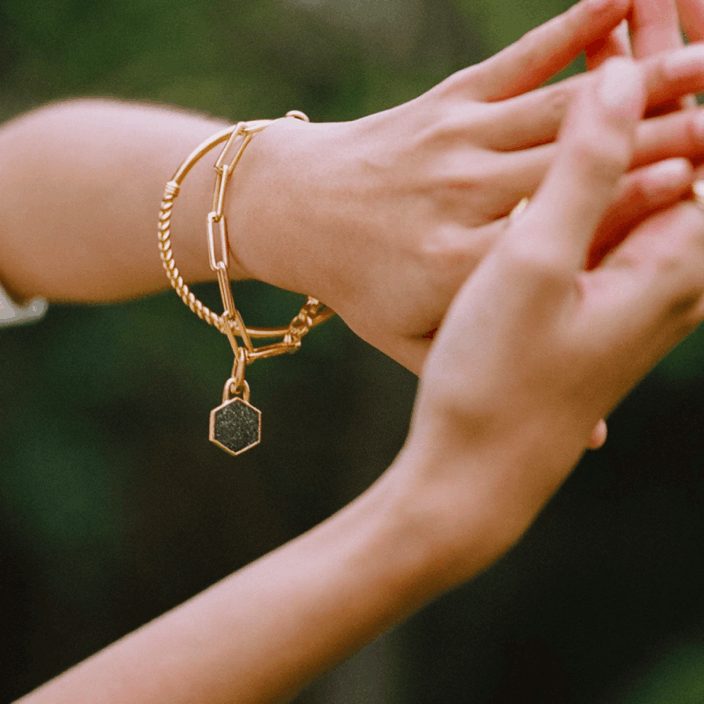 Gold link bracelet with a hexagon charm